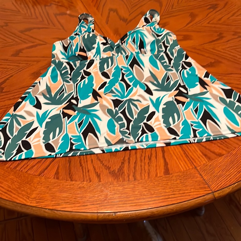 Women’s swim top, multi color. Adjustable straps.  Size 14